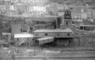 Ffaldau Colliery in 1986 during demolition. You can see the head frame on the right.